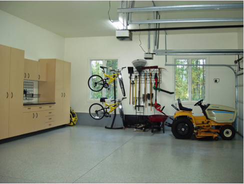 A garage using our decorative chip flake floor coatings.