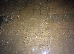Clear, thin-mil nude concrete floor