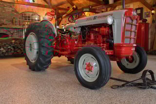 A tractor sitting over our decorative chip coatings.