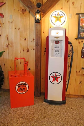 An antique gas pump in Dave's man cave sitting over our decorative chip coatings.