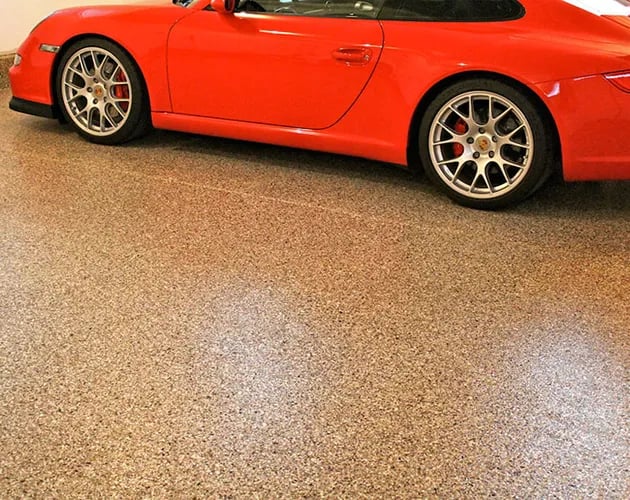porsche-epoxy-garage-floor-montgomery-county-1-630x500