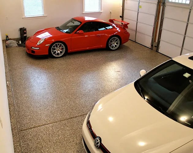 porsche-epoxy-garage-floor-montgomery-county-3-630x500