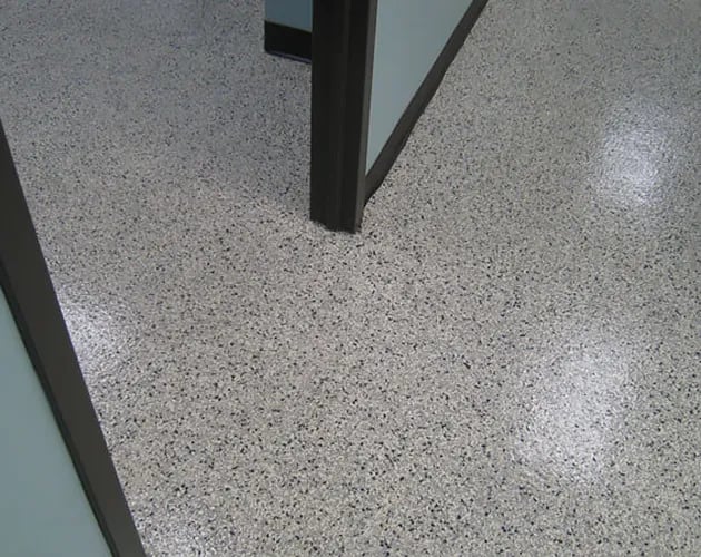 Decorative chip epoxy warehouse coatings by STRONGHOLD FLOORS