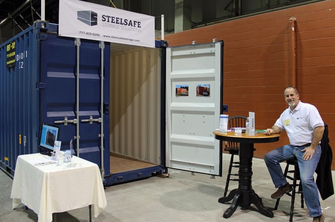 SteelSafe Storage Solutions at a home show. These containers can be used during a garage floor coatings project to store items. 