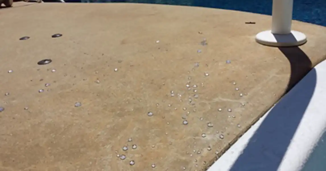 Sealer on concrete in action.