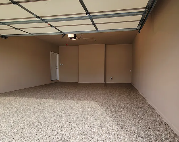 Decorative chip, epoxy, polyaspartic polyurea garage floor coatings in Harrisburg, Pennsylvania.