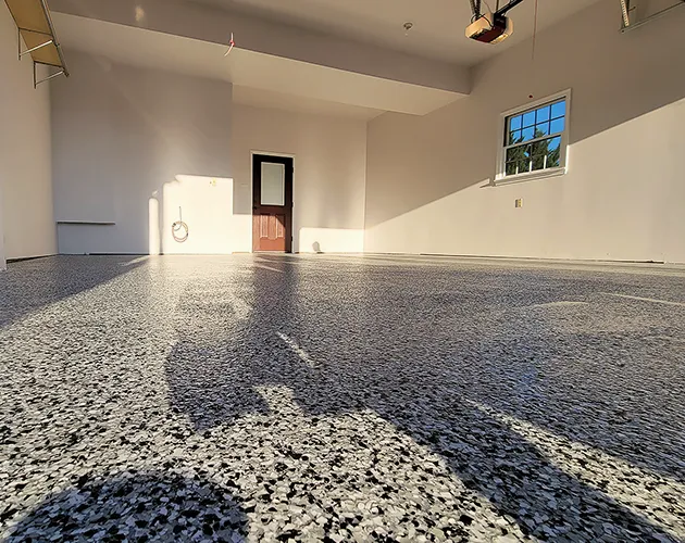 Fresh top coat applied to decorative chip floor in Camp Hill, PA