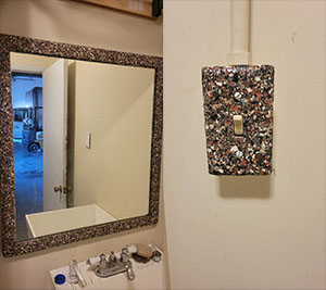 epoxy coatings on mirror and light switch